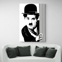 Tableau Street Art Charlie Chaplin canape blanc
